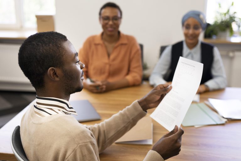 man-holding-contract-his-new-office-job-after-interview